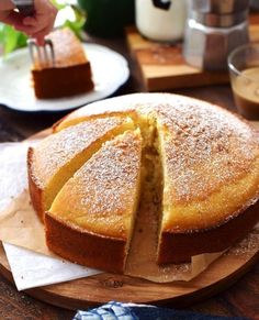 a cake is cut into slices on a cutting board