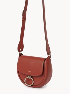 On the lookout for a bag that combines style, sophistication, and practicality? Look no further. This luxurious shoulder bag, crafted from 100% domestic calf leather, is the perfect accessory to elevate any outfit, simultaneously infusing it with a chic, autumnal vibe. One-size-fits-all for maximum versatility. Handcrafted from 100% domestic calf leather, ensuring a high-quality, durable finish. Autumn Leaf color adds a touch of warmth and is versatile enough to match any outfit. Modern Cognac Saddle Bag With Detachable Strap, Cognac Calf Leather Shoulder Bag For Work, Elegant Everyday Leather Saddle Bag, Timeless Leather Saddle Bag With Detachable Handle, Cognac Leather Bag With Round Handle, Timeless Shoulder Bag With Adjustable Strap In Calf Leather, Chic Leather Shoulder Bag With Round Handle, Elegant Everyday Saddle Bag With Leather Lining, Chic Cognac Saddle Bag For Formal Occasions