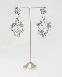 These elegant earrings feature a scattering of sparkly Austrian crystals and opals for a stunning addition to your bridal look! Twigs & Honey 825 Earrings are Silver in color. Click here to view additional photos. Elegant Sets, Bridal Look, Clear Crystals, Opal Crystal, Austrian Crystal, Elegant Earrings, Bridal Looks, Earrings Silver, Clear Crystal