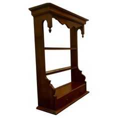 an old wooden shelf with drawers and shelves on the top, isolated against a white background