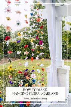 a white gazebo with flowers hanging from it and the words how to make hanging floral garland