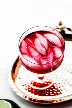 a close up of a drink in a glass on a tray