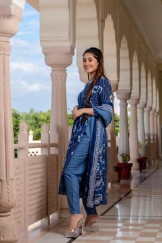 Grab this beautiful 3-piece set. The set comes with printed kurta has v neck, 3/4th sleeves & calf length teamed with printed trouser pants and a chanderi cotton dupatta to match. Color - Blue Kurta Fabric-Viscose Pant Fabric-Viscose Dupatta Fabric- Chanderi Cotton Neck-V Neck Sleeves-3/4th Sleeves Work - Print Detailing Washing Instructions-Dry Clean Model Height - 5.5 wearing size small. DISCLAIMER - The color of the product may be differ due to screen settings of device. A misprint here and a colour drop slip there is the beauty of printing which is not treated as a defect. Indigo Straight Kurta With Dabka, Indigo Dabka Straight Kurta, Indigo Sets With Dupatta For Navratri, Indigo Navratri Set With Dupatta, Navratri Long Sleeve Pant Set With Dupatta, Indigo Unstitched Straight Kurta, Unstitched Indigo Straight Kurta, Traditional Indigo Sets For Navratri, Bohemian Straight Kurta Set With Dabka Detailing