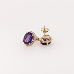 These stud earrings feature a pair of lovely purple natural, earth mined oval Amethyst in solid 14k gold with a natural diamond halo. These earrings can be a beautiful february birthstone gift for your loved ones! These earrings are made with solid 14k Gold and natural earth mined SI / G-H Diamonds. As listed, these earrings are ready to ship. If you're interested in purchasing this setting with a different center stone please message us! Purple Oval Fine Jewelry Earrings, Timeless Oval Gemstone Earrings, Oval Amethyst Earrings With Gemstone Accents, Timeless Oval Purple Jewelry, Designer Silver Jewellery, Jewelry Showcases, Birthstone Gifts, February Birthstone, Natural Earth