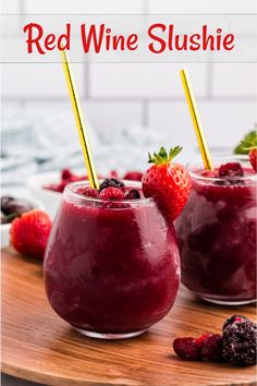 two glasses filled with red wine slushie and strawberries