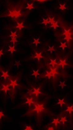 red and black background with stars in the middle