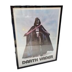 a star wars poster with darth vader on it