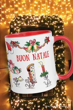 a red and white coffee mug with the words buon natale on it