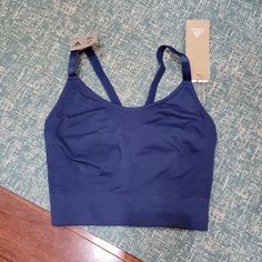 Nwt Size Xs Adidas Sports Bra. It Is Low Support. Color Is Dark Blue. No Pads/Cups. Blue Compression Sports Bra With Built-in Bra, Blue Seamless Sports Bra For Athleisure, Blue Sporty Sports Bra With Seamless Construction, Blue Racerback Sports Bra With Medium Bust Support, Blue Sporty Sports Bra With Built-in Bra, Supportive Blue Sports Bra For Training, Blue Sports Bra With Seamless Construction For Workout, Blue Compression Seamless Tops, Seamless Blue Sports Bra