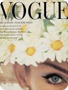 a magazine cover with a woman's face and daisies in her hair on top of her head