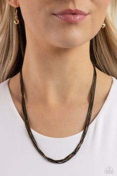 Featuring shiny gold and glistening gunmetal links, six strands of slim snake chains drape across the chest for an edgy mixed metallic finish. Features an adjustable clasp closure.

 Sold as one individual necklace. Includes one pair of matching earrings. Black Gold Chain, Toggle Bracelet, Paparazzi Accessories, Black Necklace, Paparazzi Jewelry, Stunning Necklace, Gold Chain Necklace, Necklace Earring Set, Snake Chain