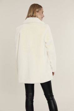 Mid Length Faux Fur Coat – Dolce Cabo Solid Faux Fur Coat For Cold Weather, Fitted Winter White Faux Fur Coat, Winter White Fitted Faux Fur Coat, Plush-lined Fur Coat For Cold Weather, Mid Length Coat, Winter Cape-shaped Faux Fur Coat, Fitted Faux Fur Mink-colored Outerwear, Long Mink-colored Faux Fur Coat, Sleek Look