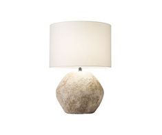 a lamp with a white shade on top of it and a light in the middle