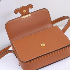 Size: 18.5cm*14cm*6cm It comes with Dust box, Care manual, Tag, and Paper bag. Designer Brown Crossbody Box Bag, Designer Everyday Rectangular Belt Bag, Designer Rectangular Belt Bag For Everyday Use, Designer Brown Box Shoulder Bag, Designer Brown Shoulder Box Bag, Designer Satchel Flap Bag For Mobile Phone, Designer Rectangular Belt Bag For Daily Use, Designer Rectangular Saddle Bag For Shopping, Designer Brown Square Shoulder Bag