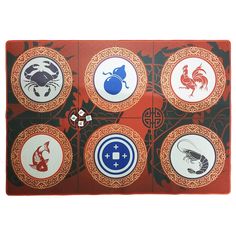 four coasters with different designs on them, each featuring an image of crabs and crab