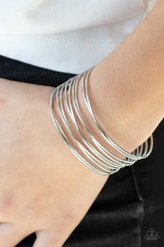 Glistening silver wire crisscrosses across the wrist, coalescing into an edgy cuff around the wrist. Sold as one individual bracelet. Live Text, Paparazzi Accessories, Wire Bracelet, Paparazzi Jewelry, Silver Cuff Bracelet, Silver Bangles, Silver Cuff, Silver Hoops, Silver Wire