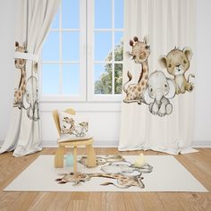 a child's room with white curtains and giraffes on the wall