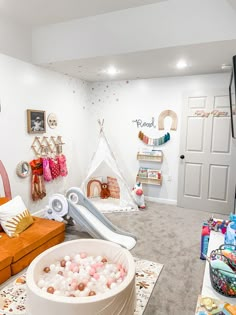 a child's playroom with toys and accessories