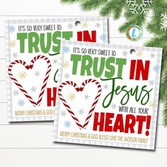 two christmas tags with the words trust in jesus