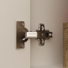 a close up of a door handle on a wall