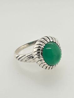 "Artisan Chrysoprase & Sterling Silver Ring -Artisan, nicely made statement ring -A large bright green oval chrysoprase stone bezel set in Sterling Silver -Vertical and angled lines along the setting and either side of the band -Ring is hallmarked \"925\" -Ring is size 10.5 -Face of ring measures about .57\" x .66\" with a depth of .33\" -Chrysoprase stone measures 12mm x 10mm oval -Total weight 5.4g -Ring is in excellent, new condition, ready to wear and enjoy" Green Oval, Handcrafted Artisan Jewelry, 925 Ring, Ring Pictures, Bright Green, Turquoise Stone, Statement Ring, Rings Statement, Sterling Silber