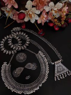 This beautiful set of 6 has a big long Haram necklace with a choker silver necklace, pair of jhumka earrings, a ring,pair of bangles, and a nose pin. Grab this beautiful set with any of the ethnic/ Indo western outfit and look unique in the crowd Premium quality set!! Silver Sets For Navratri Festival, Silver Festive Sets For Navratri, Silver Temple Jewelry Sets For Festivals, Bollywood Silver Sets For Festivals, Bollywood Style Silver Sets For Festivals, Silver Sets For Festivals, Traditional Silver Sets For Navratri, Silver Heavy Sets For Diwali, Festive Silver Sets With Intricate Design