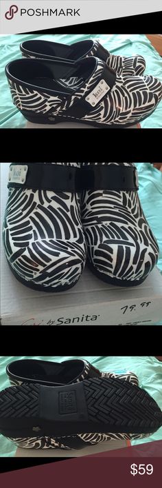 Black and white sanitas Koi by Sanitas, black and white zebra print, brand new in the box, perfect for nurses or cosmetologist, or prolong periods on feet. Sanitas Shoes Mules & Clogs White Zebra, Mule Clogs, Zebra Print, Mules Shoes, The Box, Koi, Clogs, Black White