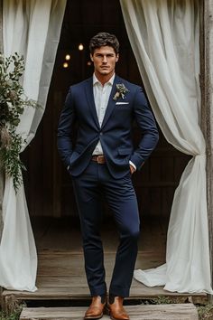 Incorporating cowboy boots into your groomsmen’s outfits brings a unique blend of rustic charm and timeless style to a wedding day. By pairing these iconic boots with classic or modern suits… Blue Wedding Tuxedo Groom, Groom Suit Ideas Blue, Suit Boots Men, Navy Blue Groomsmen Suits Cowboy Boots, Groom Fall Suit, Sports Coat And Jeans Wedding, Groomsmen With Jeans, Suit With Boots Men, Groom Blue Suit Wedding