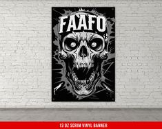 a black and white skull with the word fafao on it's face