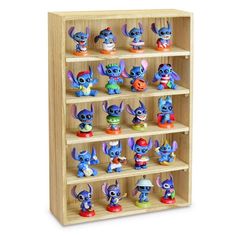 a wooden shelf filled with lots of toy figurines