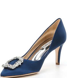 a women's blue high heel shoe with a jeweled buckle on the side