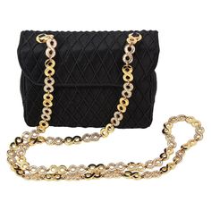 Judith Leiber Black Satin Crossbody Bag with Gold Infinity Chain Luxury Bags With Gold Clasp For Formal Occasions, Classic Formal Shoulder Bag With Gold Chain, Luxury Formal Bags With Gold Chain, Elegant Gold Shoulder Bag For Business, Luxury Formal Shoulder Bag With Gold Chain, Classic Gold Shoulder Bag With Chain, Evening Crossbody Shoulder Bag With Chain, Classic Gold Bag With Chain Detail, Gold Bags With Gold Chain In Classic Style