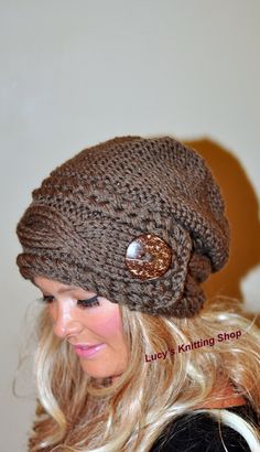 a woman wearing a brown knitted hat with buttons