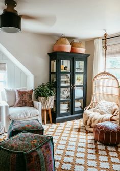 a living room filled with furniture and decor