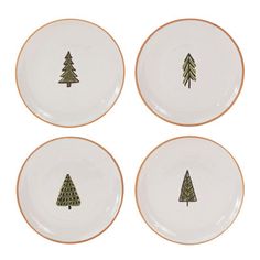 four plates with trees painted on them in gold and white, each one has an individual's own design