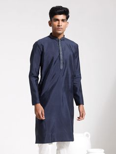 VASTRAMAY Men's Navy Blue Silk Blend Kurta A stylish addition to your ethnic wardrobe, this navy blue silk blend kurta offers both comfort and elegance. Crafted with precision, it features exquisite detailing and a rich color that complements various occasions. Features Rich navy blue color Smooth silk blend fabric Elegant design Comfortable fit Specifications Color: Navy Blue Material: Silk Blend Sleeve Type: Full Sleeves Neck: Mandarin Collar Material & Care This kurta is made from a high-qual Festive Long Sleeve Indigo Kurta, Long Sleeve Indigo Kurta For Festive Occasions, Indigo Long Sleeve Kurta For Diwali, Navy Blue Color, Blue Silk, Full Sleeves, Mens Navy, Mandarin Collar, Full Sleeve