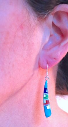 "This is a pair of Zuni multi gem inlay earrings. They are set in sterling silver with sterling earring hooks. -approx. 2\" X 1/4\" at the widest point -stamped sterling Check out the rest of our collection: https://www.etsy.com/shop/NewMexicoGems" Turquoise Inlay Earrings As Gift, Turquoise Inlay Earrings Gift, Multicolor Pierced Dangle Jewelry, Southwestern Green Sterling Silver Earrings, Blue Sterling Silver Earrings With Inlay, Unique Blue Earrings With Inlay, Unique Blue Inlay Earrings, Dangle Inlay Earrings For Gifts, Inlay Dangle Earrings For Gift