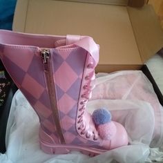 I Have Here A Brand New Pair Of Knee High Boots Never Worn From Dollskill. They Are Size 8 And Pink/Purple In Color. They Have A Side Zip Closure. I Only Tried Them On Once And They Are To Small For My Calfs Unfortunately. These Would Go Great With A Clown Costume For Halloween Or Anything Really :). Thanks For Looking :). Purple Leather Platform Boots With Round Toe, Purple Leather Round Toe Platform Boots, Pink Flat Heel Boots For Party, Pink Closed Toe Boots For Winter, Pink Closed Toe Winter Boots, Trendy Purple Platform Boots, Cute Pink Synthetic Boots, Purple Platform Boots With Round Toe, Purple High-top Platform Boots