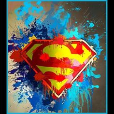 the superman symbol is painted on top of paint splatters and blue, yellow, red