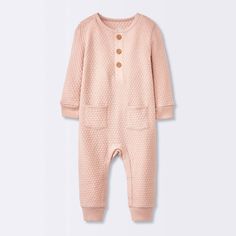 Keep your little one nice and cozy by dressing them up in the Sweater Romper from cloud island™. This Henley romper is made from 100% cotton fabric to offer soft and breathable comfort all day long. This pink sweater romper features jacquard-knit detailing for texture and artistic style. The front pockets add to the look, while the ribbed cuffs and hem offer a snug fit. Designed with a Henley neckline, this long-sleeve romper includes front buttons and crotch snaps for quick and easy dressing an Cotton Long Sleeve Jumpsuits And Rompers For Playwear, Playful Long-sleeve Bubble Romper For Loungewear, Playful Long Sleeve Bubble Romper For Loungewear, Playful Long Sleeve Bubble Romper For Playwear, Cozy Cotton Jumpsuits And Rompers For Loungewear, Playful Pink Long Sleeve Jumpsuits And Rompers, Playful Long Sleeve Pink Jumpsuits And Rompers, Winter Cotton Bubble Romper With Long Sleeves, Winter Long Sleeve Cotton Bubble Romper