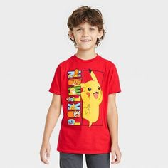 Add some electrifying anime flair to your child's tee collection with this Pokémon Graphic T-Shirt. Made from 100% cotton, this crewneck T-shirt is tailored in a regular fit that hits below the waist to keep them comfortable during any activity. The bright red T-shirt is highlighted by a front illustration of yellow Pikachu standing against vertical, vibrant text that reads "Pokémon" and is filled with many Pokémon characters for added style. Playful Red Character Print T-shirt, Red Graphic Print T-shirt For School, Playful Red T-shirt With Cartoon Print, Playful Red Cartoon Print T-shirt, Red Crew Neck T-shirt With Cartoon Print, Playful Short Sleeve Top For Fan Merchandise, Playful Red T-shirt With Character Print, Red Graphic Tee With Cartoon Print, Red Cartoon Print Crew Neck T-shirt