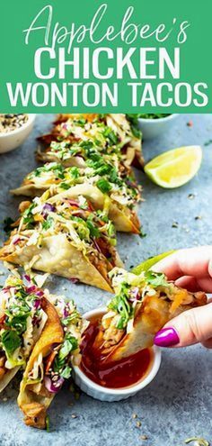 an applebee's chicken wonton tacos is shown on a plate with dipping sauce