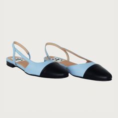 Elevate your desk-to-dinner lifestyle. with the Chloe .5' Slingback. A round toe with a stretchy slingback strap frame a rich leather look fashioned with just the perfect amount of height. The perfect round toe slingback flat! Leather upper Leather toe cap Leather lining Heel Height 0.5" Made in Italy Blue Slingback Pumps With Leather Sole, Blue Leather Sole Slingback Pumps, Formal Blue Leather Slingback Sandals, Chic Blue Leather Slingback Pumps, Blue Leather Ankle Strap Slingback Sandals, Blue Leather Slingback Pumps, Chic Blue Leather Slingback Sandals, Blue Slingback Pumps For Spring Workwear, Blue Slingback Sandals With Removable Insole