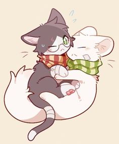 two cats are hugging each other while wearing scarves