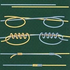 an assortment of different types of wires on a green background with white and yellow lines