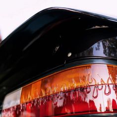 the tail light of a car that is parked