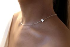 adjustable choker: shortest: 40.8 cm longest: 46.0 cm Available in gold Elegant Adjustable Charm Necklace With Star Charm, Elegant Adjustable Star Charm Necklace, Adjustable Delicate Jewelry With Star Charm, Dainty Star-shaped Wedding Jewelry, Silver Star Charm Choker Jewelry, Silver Star Charm Choker, Delicate Sterling Silver Jewelry With Star Charm, Minimalist Star Shaped Jewelry For Weddings, Delicate Silver Star Jewelry