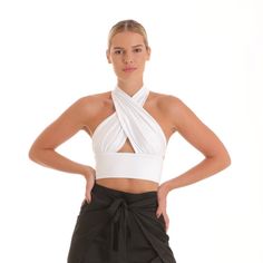 Elegant Fitted Faux Wrap Top, Elegant Multi-way Tops For Summer, Chic Multi-way Halter Top, Elegant Fitted Cropped Halter Top, Elegant Multi-way Party Tops, Chic Fitted Halter Top With Wrap-around Straps, Chic Multi-way Halter Top For Night Out, Elegant Multi-way Halter Top, Fitted Crop Top For Summer Evenings