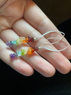 These elegant Chakra earrings feature long sterling silver earwires and all natural gemstones representing all 7 Chakras. The rainbow gemstones are: Garnet, Carnelian, Citrine, Peridot, Apatite, Iolite, & Amethyst. Add some healing crystals to your ears, and activate your Chakras for balanced energy all day! These are handmade in Oregon by me, Aurora. Each earring measures 7mm wide and 65mm long (total length including earwire) These earrings are long but lightweight! Each earring weighs approx 2 grams Rainbow Sterling Silver Nickel-free Earrings, Nickel-free Rainbow Sterling Silver Earrings, Sterling Silver Teardrop Crystal Earrings With Natural Stones, Fusion Earrings With Natural Stones In Sterling Silver, Teardrop Sterling Silver Crystal Earrings With Natural Stones, Sterling Silver Wire Wrapped Linear Earrings For Gifts, Sterling Silver Wire Wrapped Linear Earrings As Gift, Rainbow Sterling Silver Dangle Jewelry, Rainbow Gemstone Jewelry In Sterling Silver