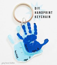 a handprint keychain is shown with the words diy handprinted on it